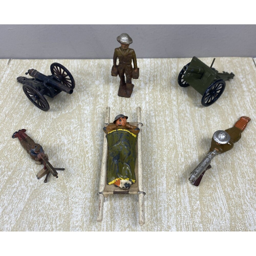 Set of 4 Vintage Barclay Lead WWI Soldiers 1 Stretcher and 2 Die cast Cannons